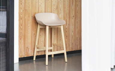 White Hyg Upholstered Bar Chair with an oak base