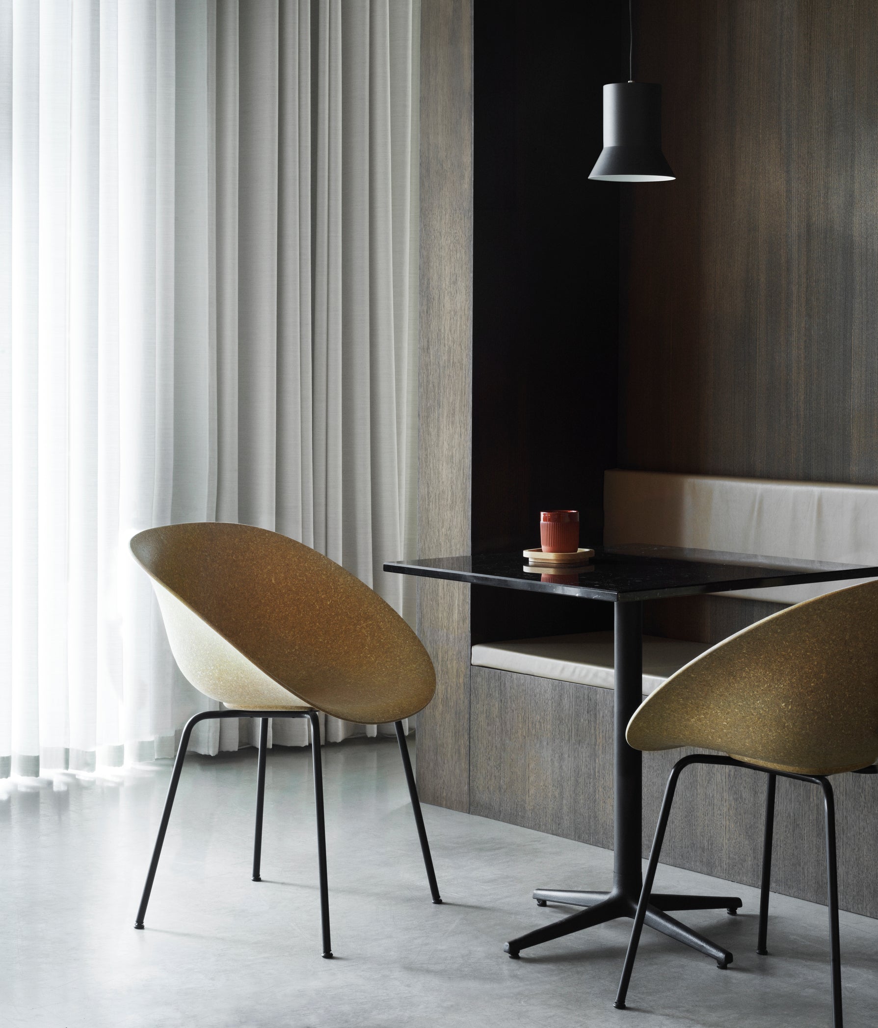 Armchair Green Mat chair with a black base
