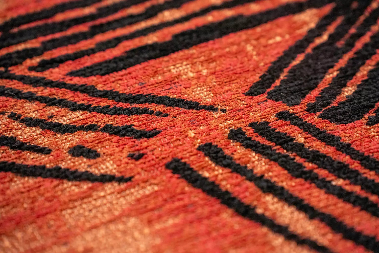 Runder Teppich KANJI orange mit schwarz