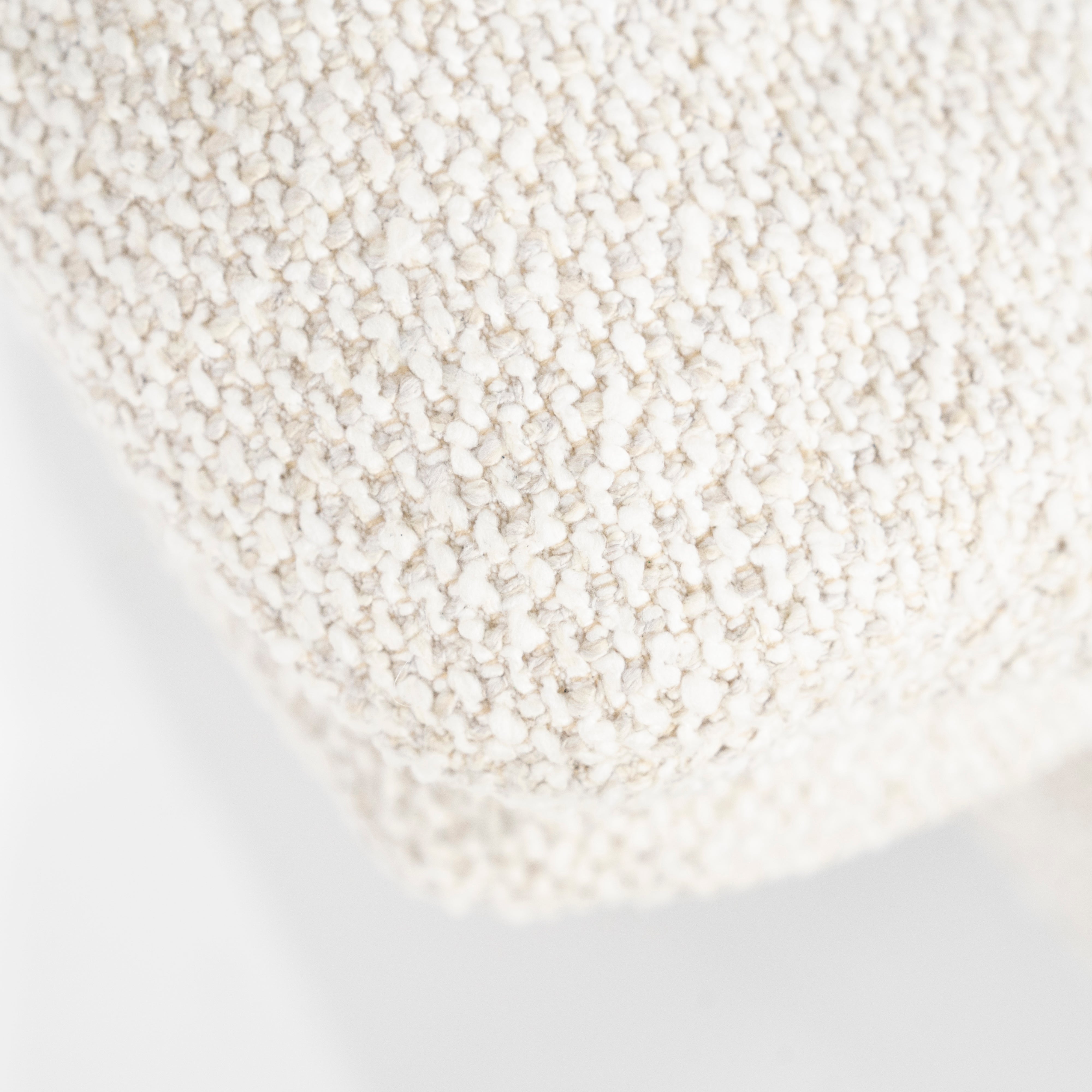 CALEB beige armchair with black base and footrest