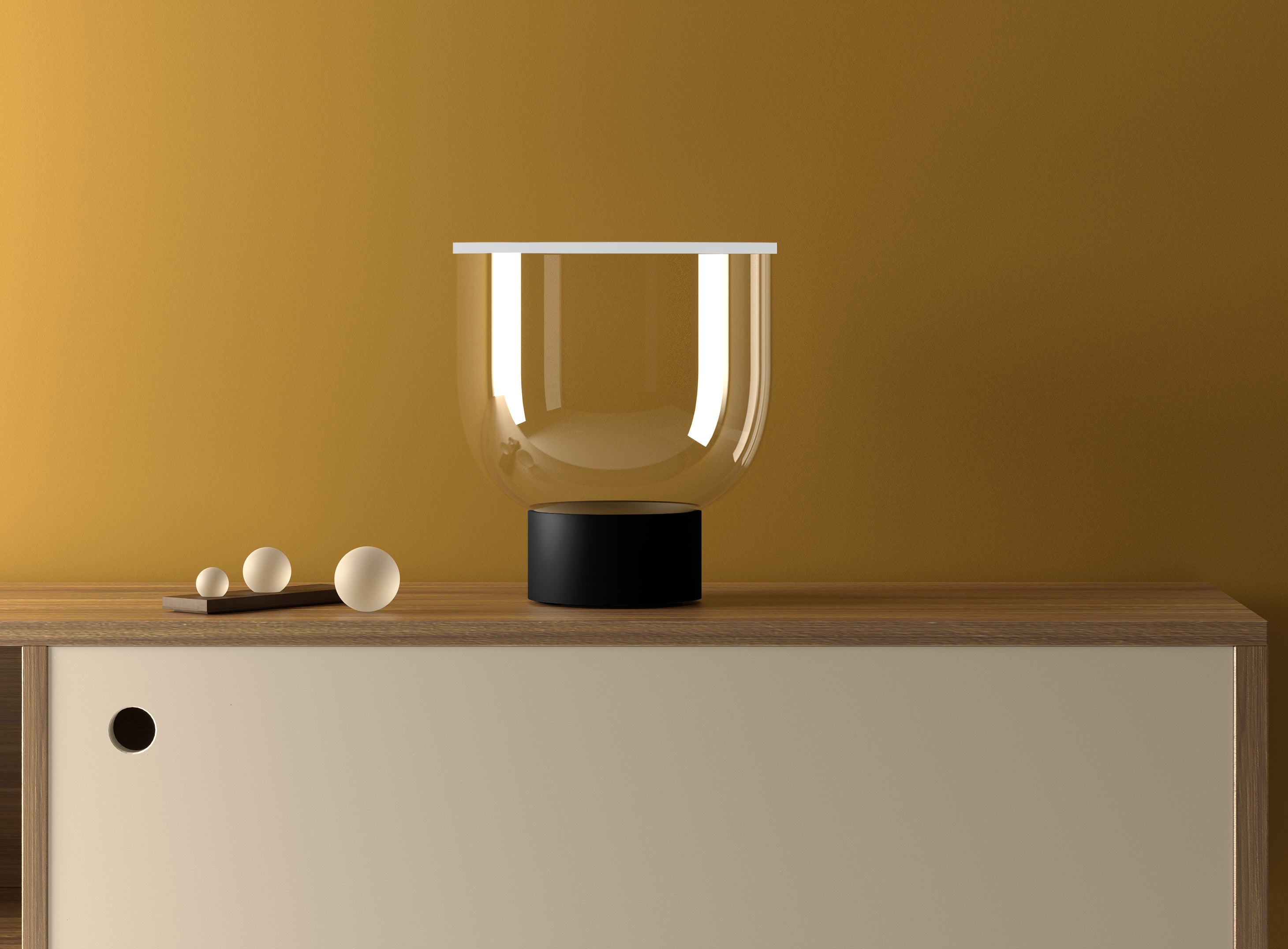 GRAMMOLUCE table lamp with a glass shade and black base.