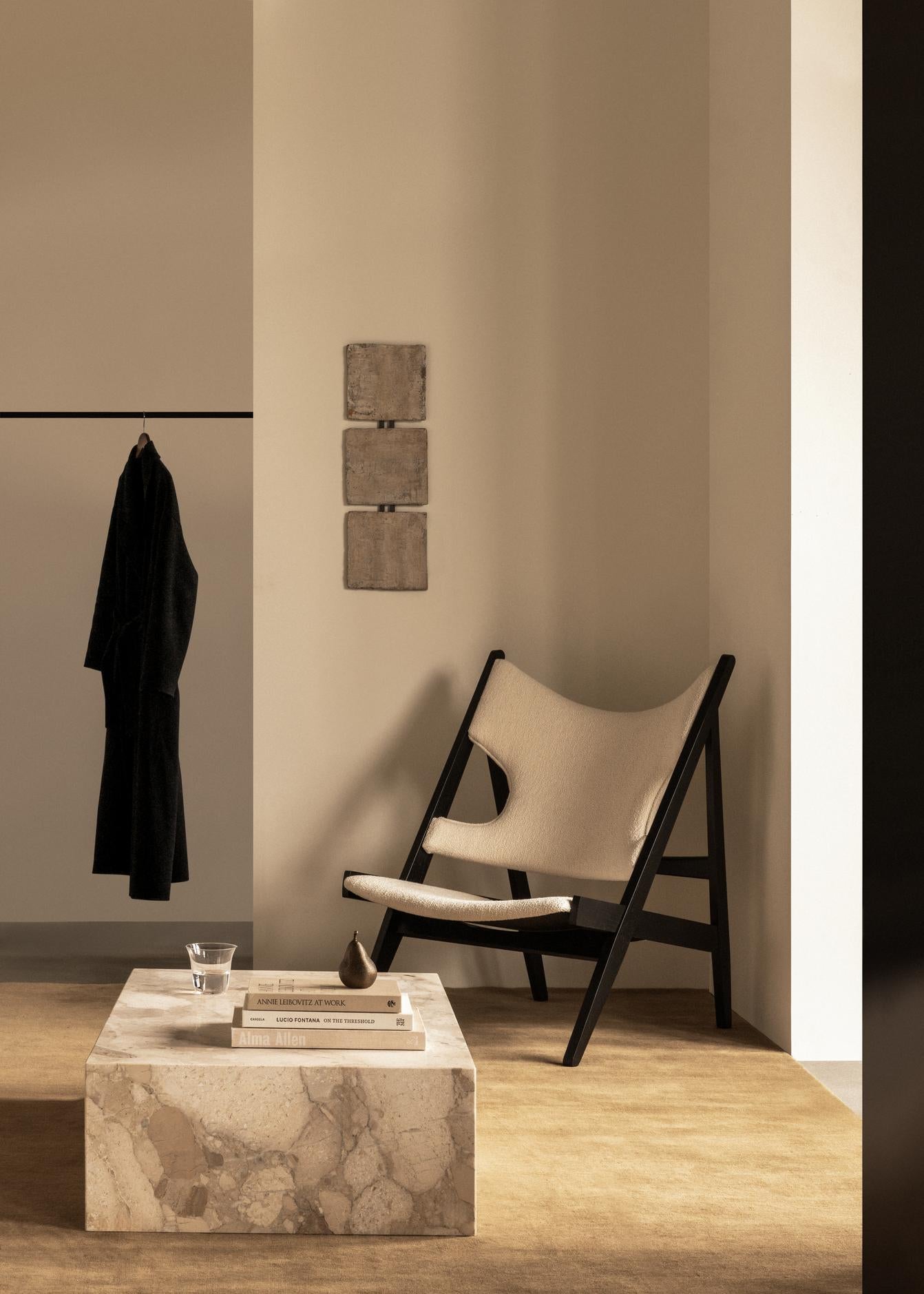 KNITTING armchair in cognac leather with oak base