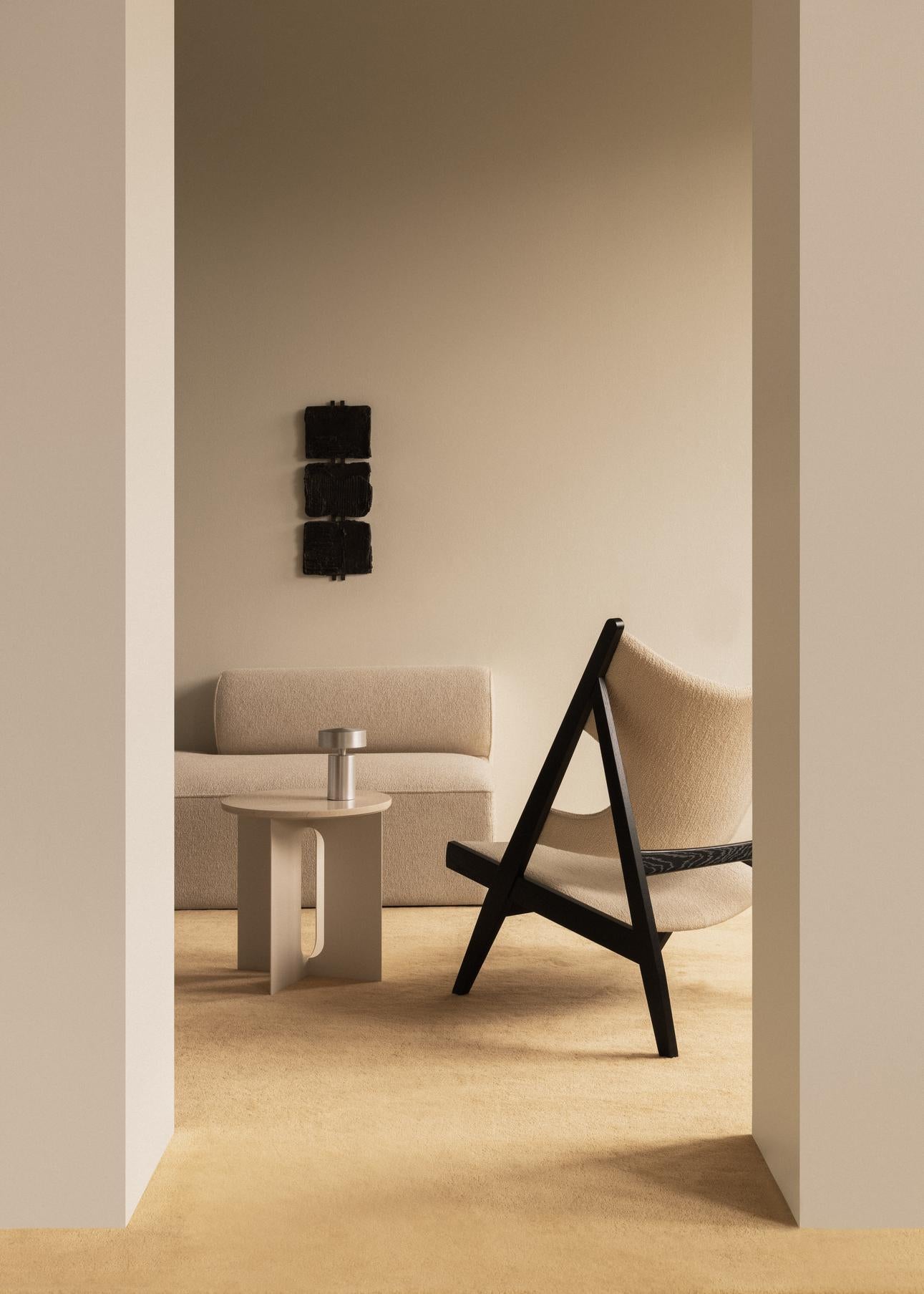 KNITTING armchair in cognac leather with oak base