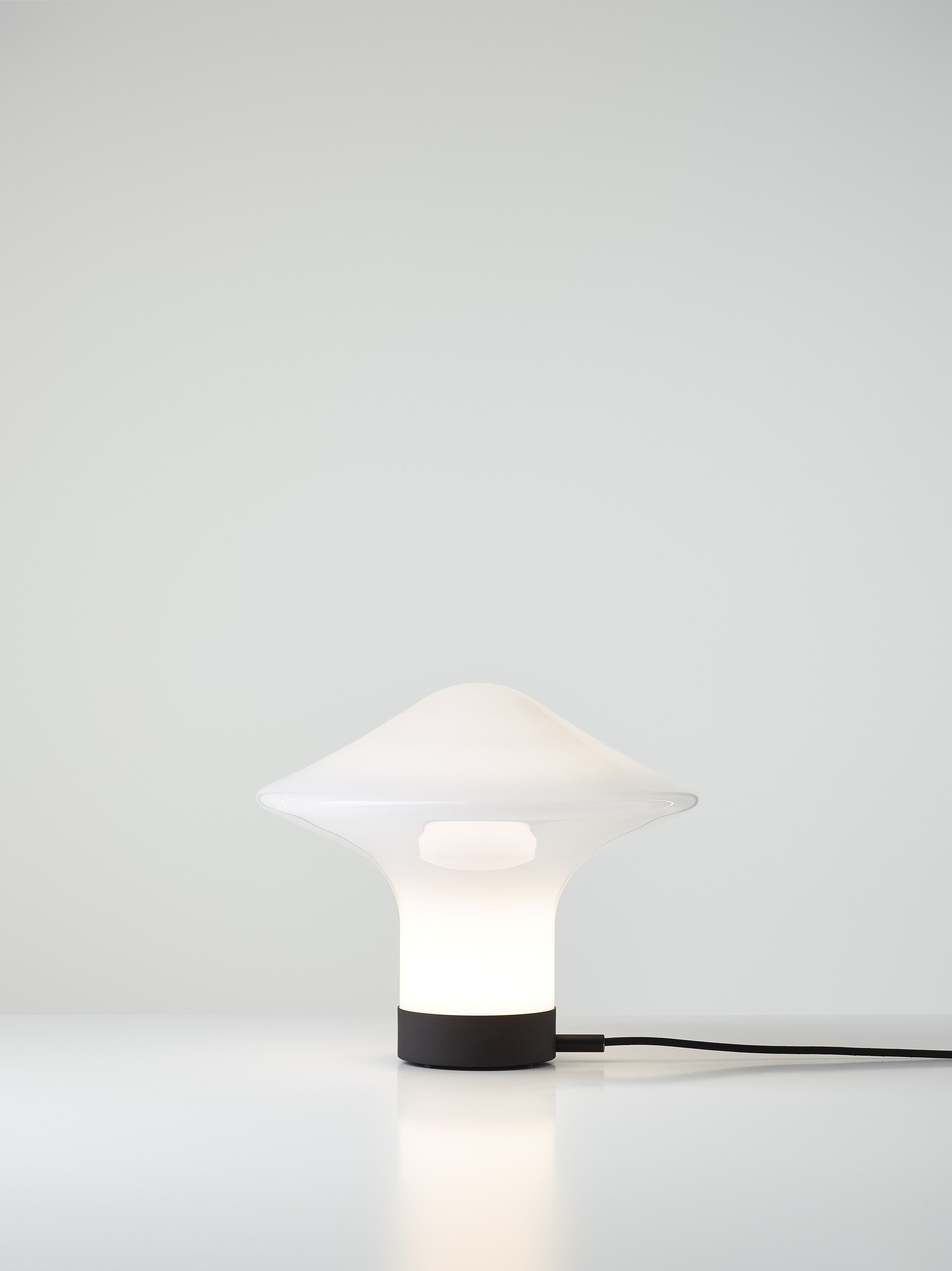 Trottel -Tischlampe Informiertes Glas