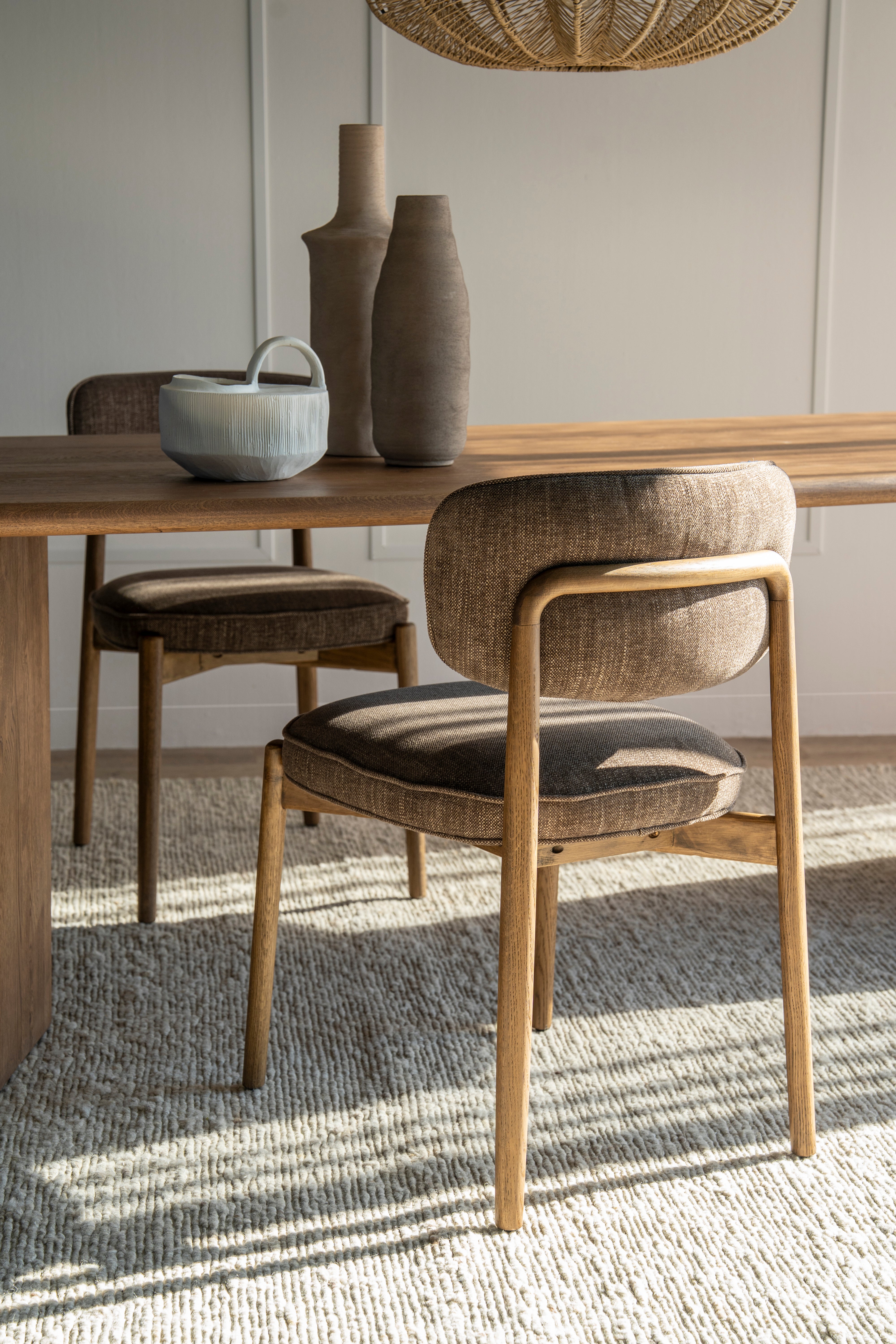 RUNE Chair in brown with a light oak base