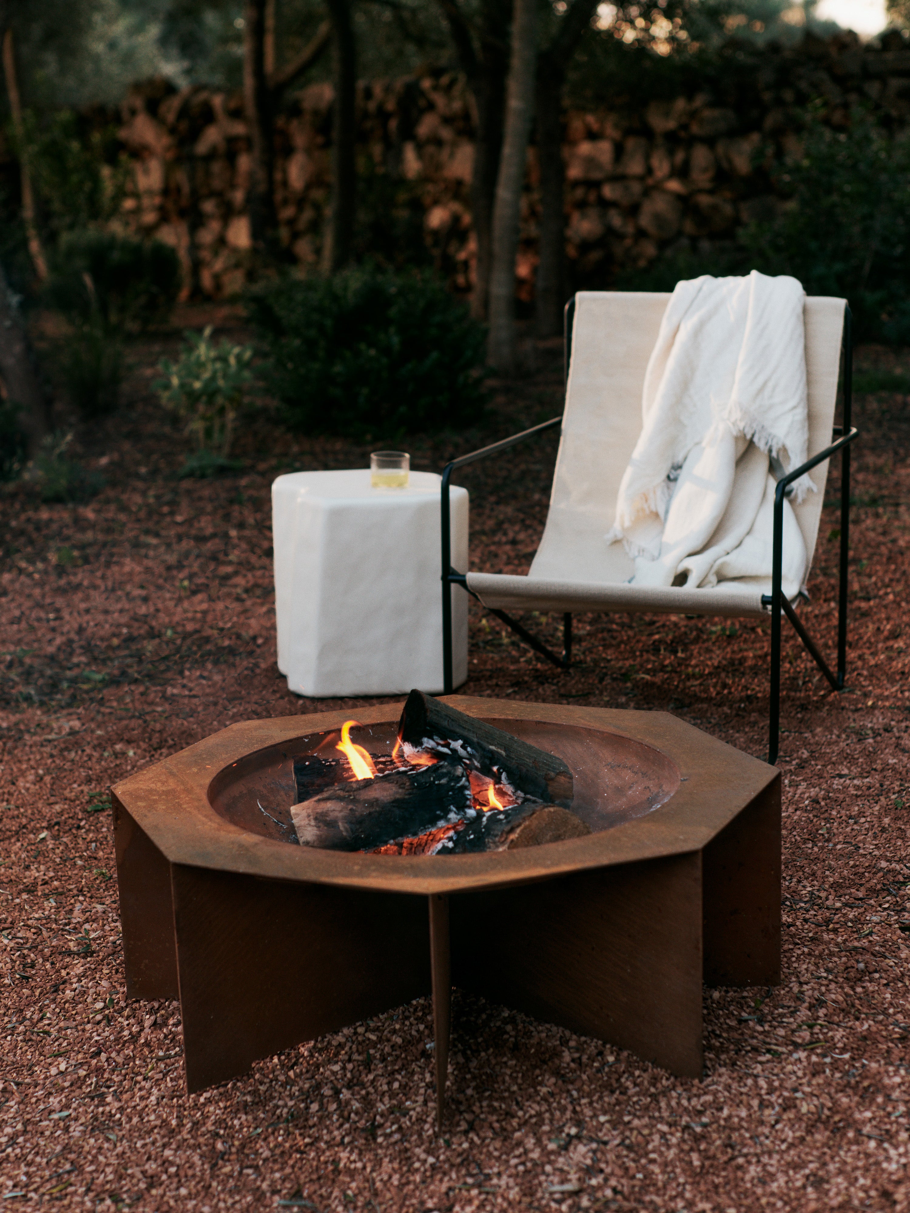 Desert beige garden armchair with a black base