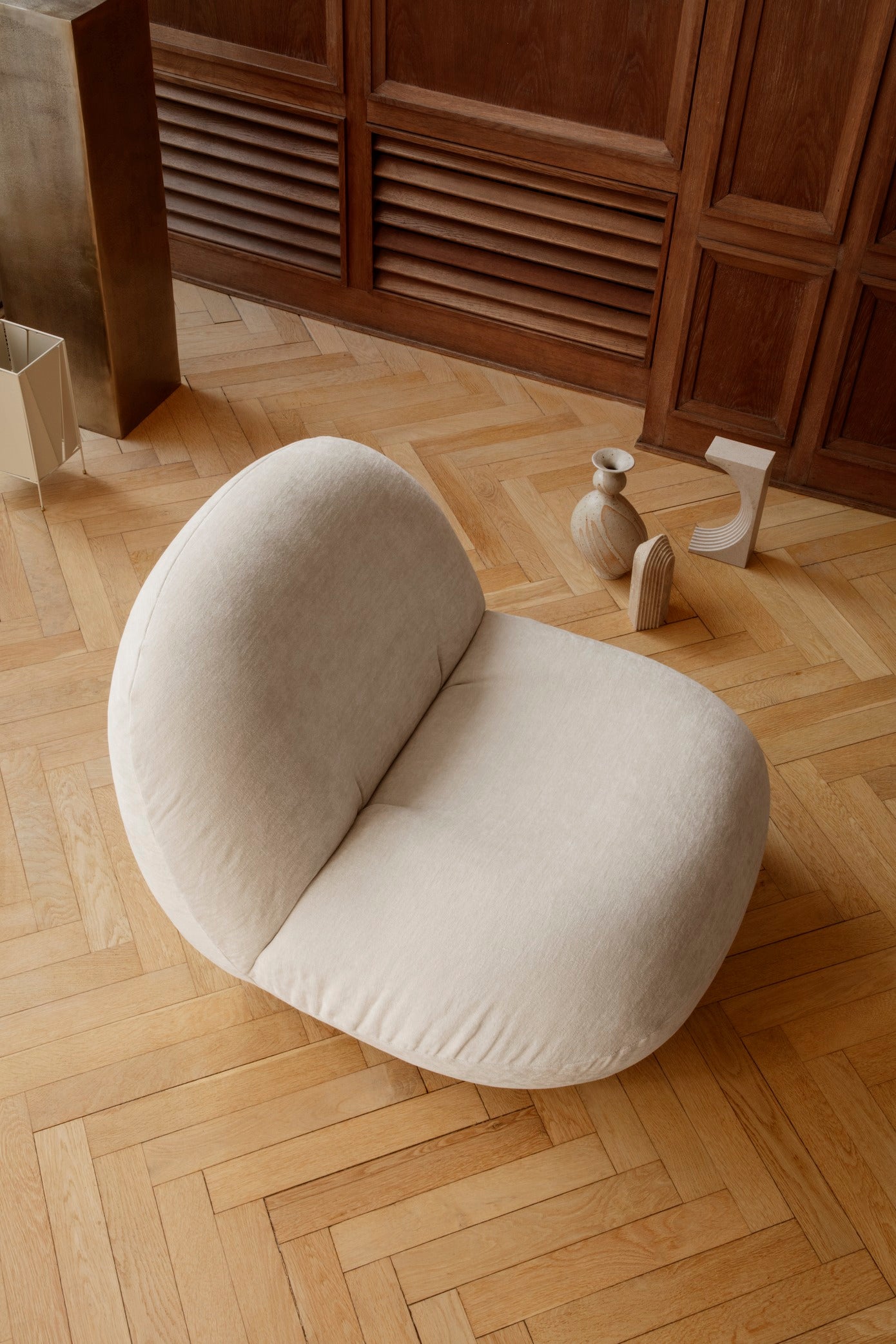 PACHA upholstered armchair with a gold base