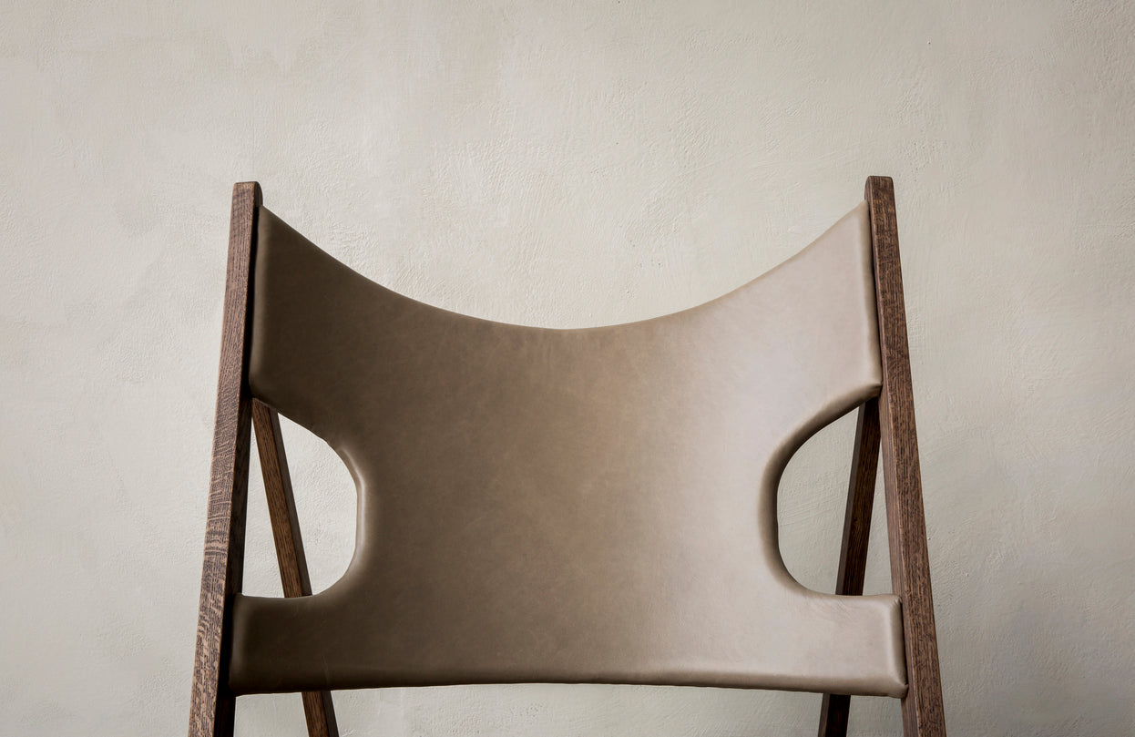 KNITTING armchair in cognac leather with oak base