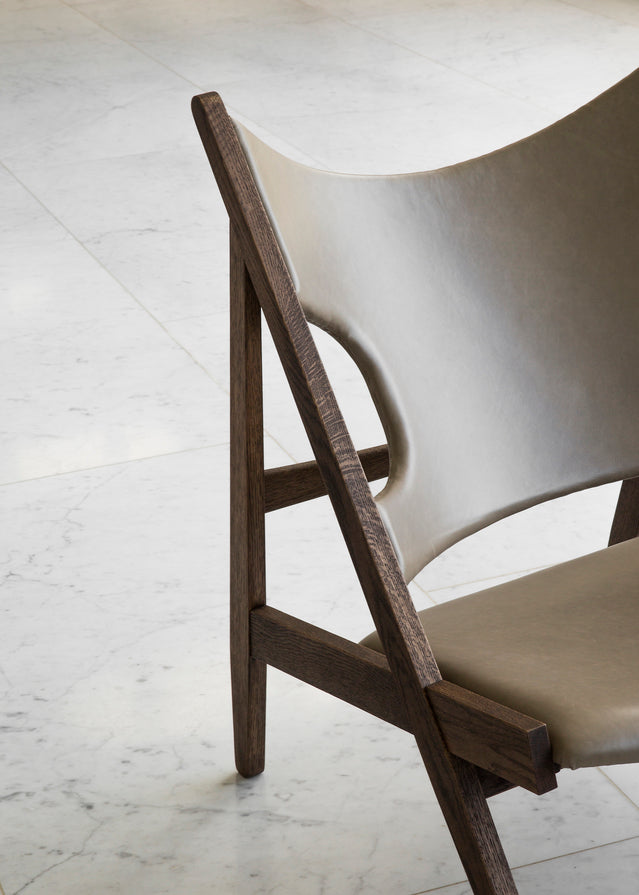 KNITTING armchair in cognac leather with oak base