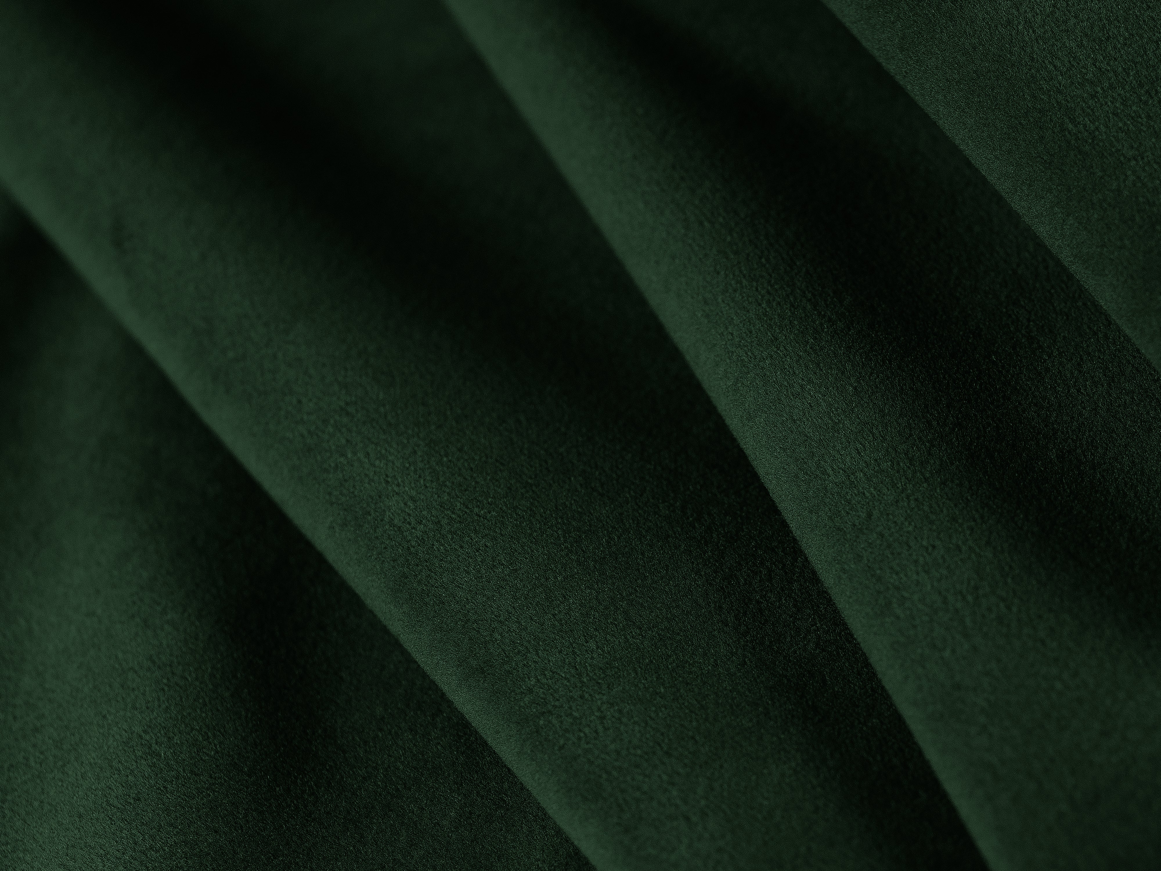 Right-facing velvet corner sofa bed JODIE in bottle green