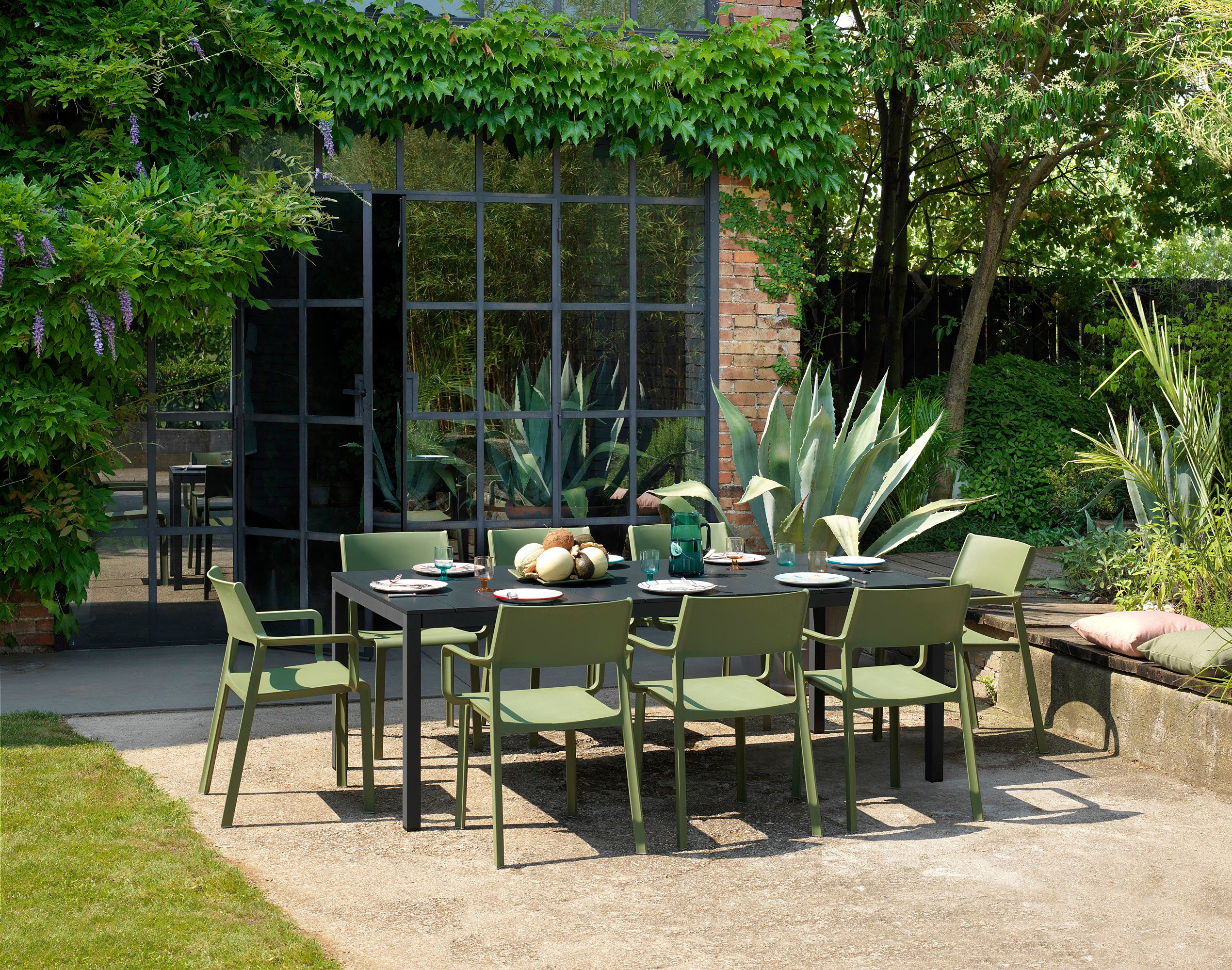 Outdoor chair with armrests TRILL in teal blue