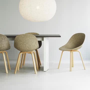 Upholstered chair green mat with a beech base