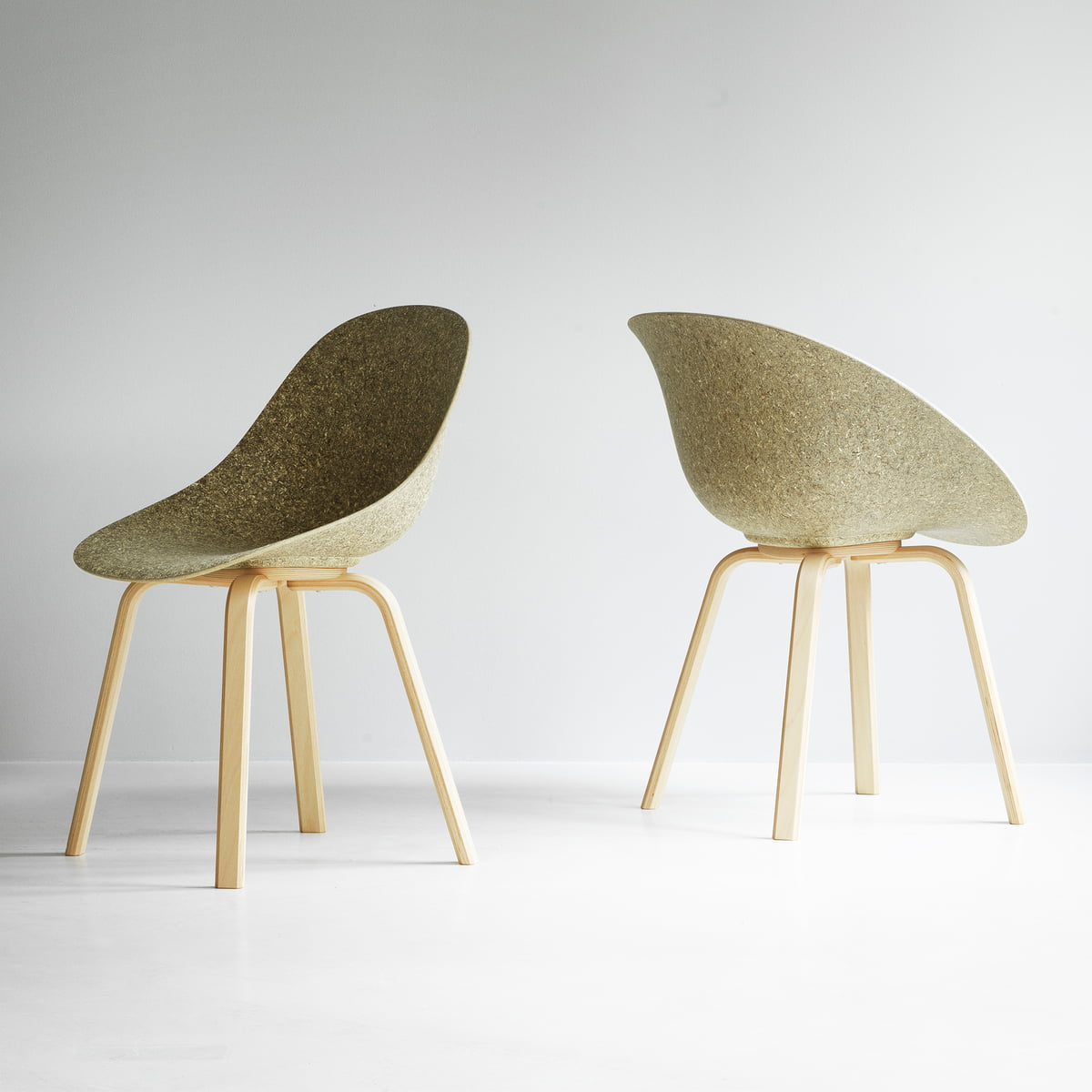 Upholstered chair green mat with a beech base