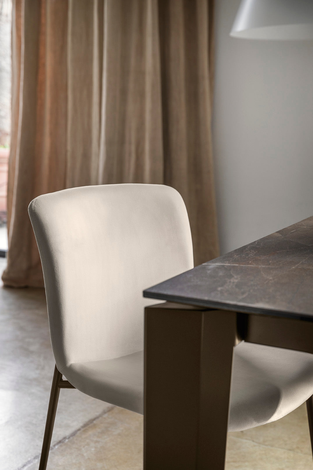 LOVE upholstered chair with a black base