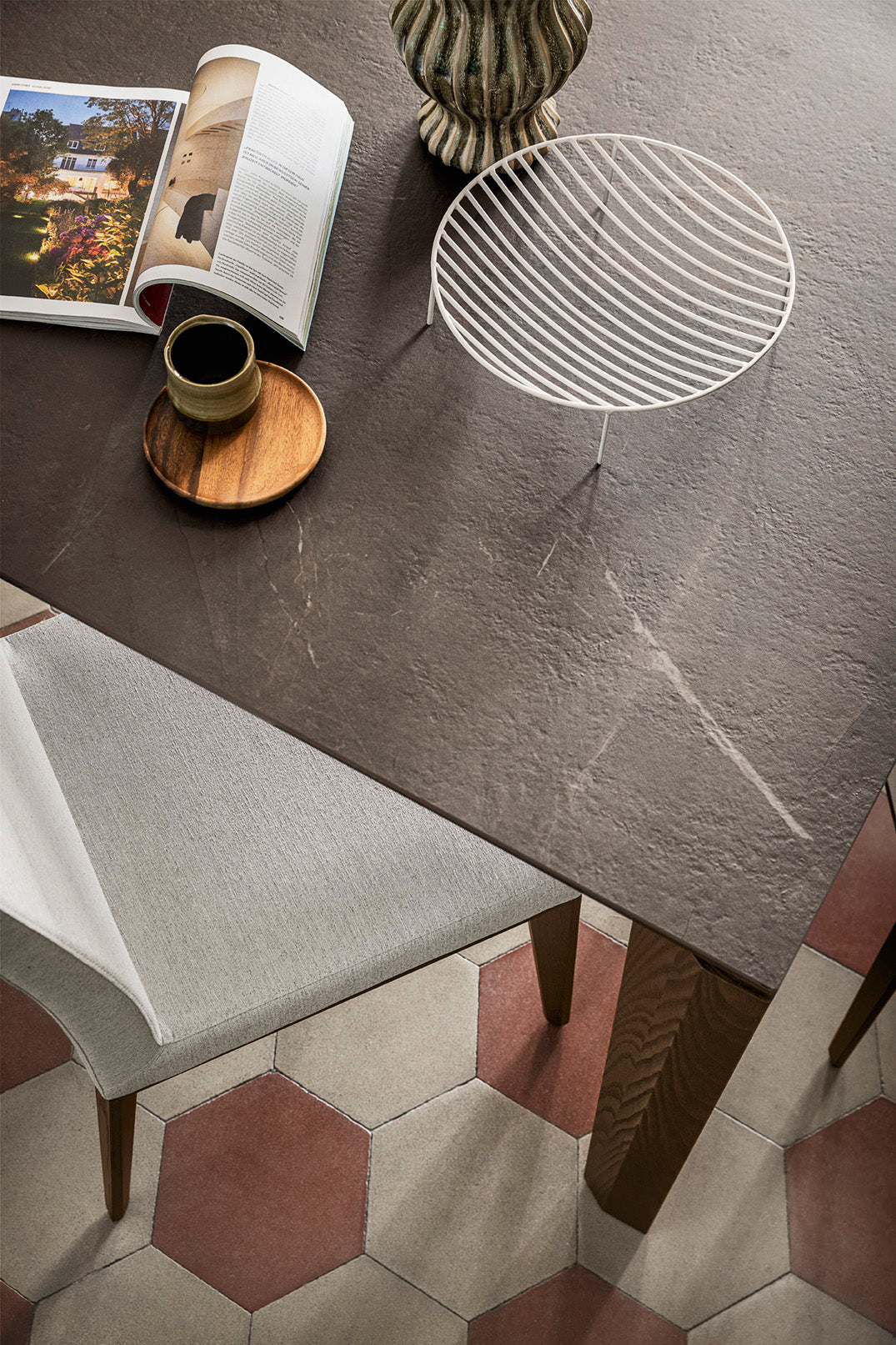 BESS LOW upholstered chair with a dark wooden base