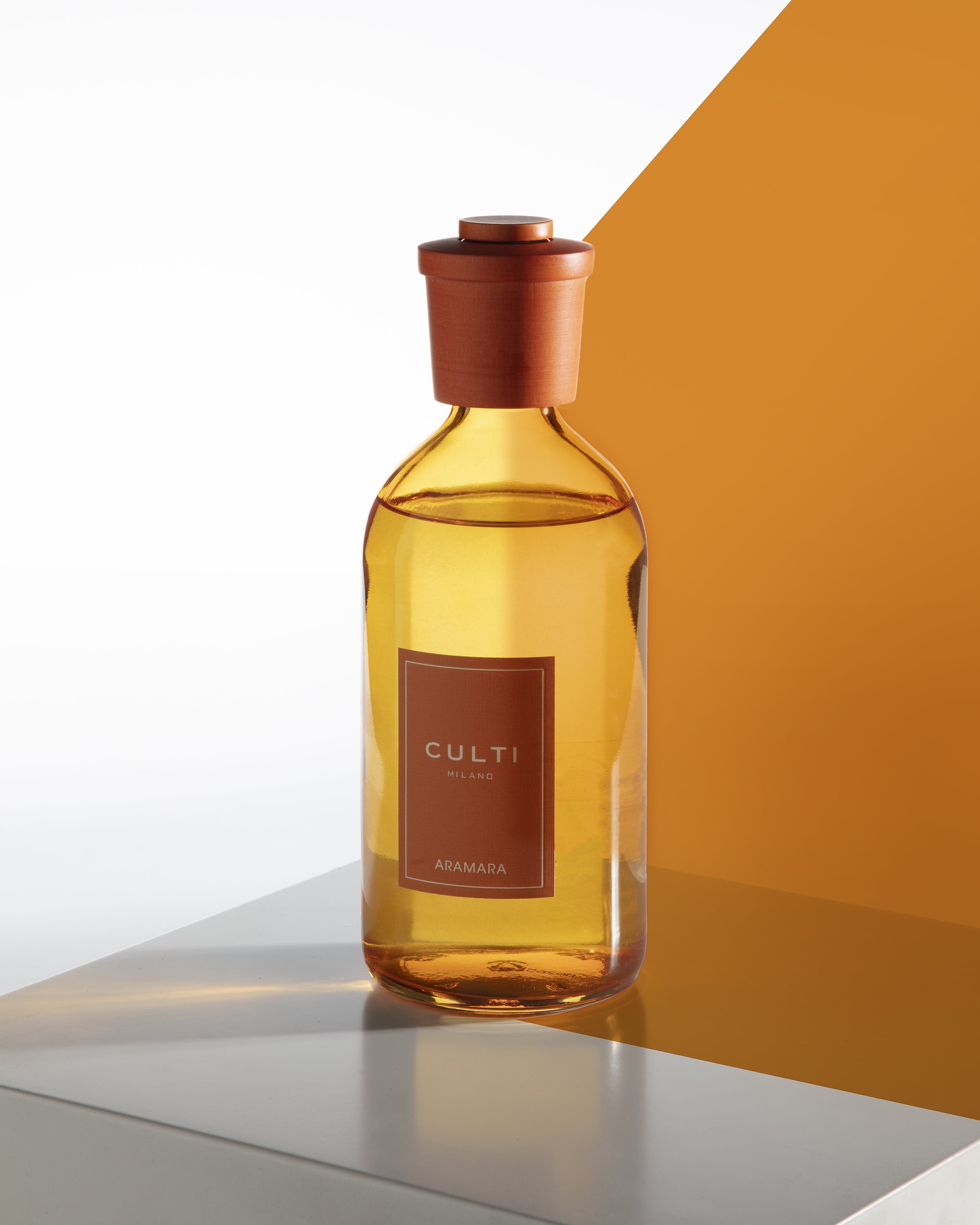 Orange Aramara fragrance diffuser with notes of bitter orange, bergamot, and sandalwood.