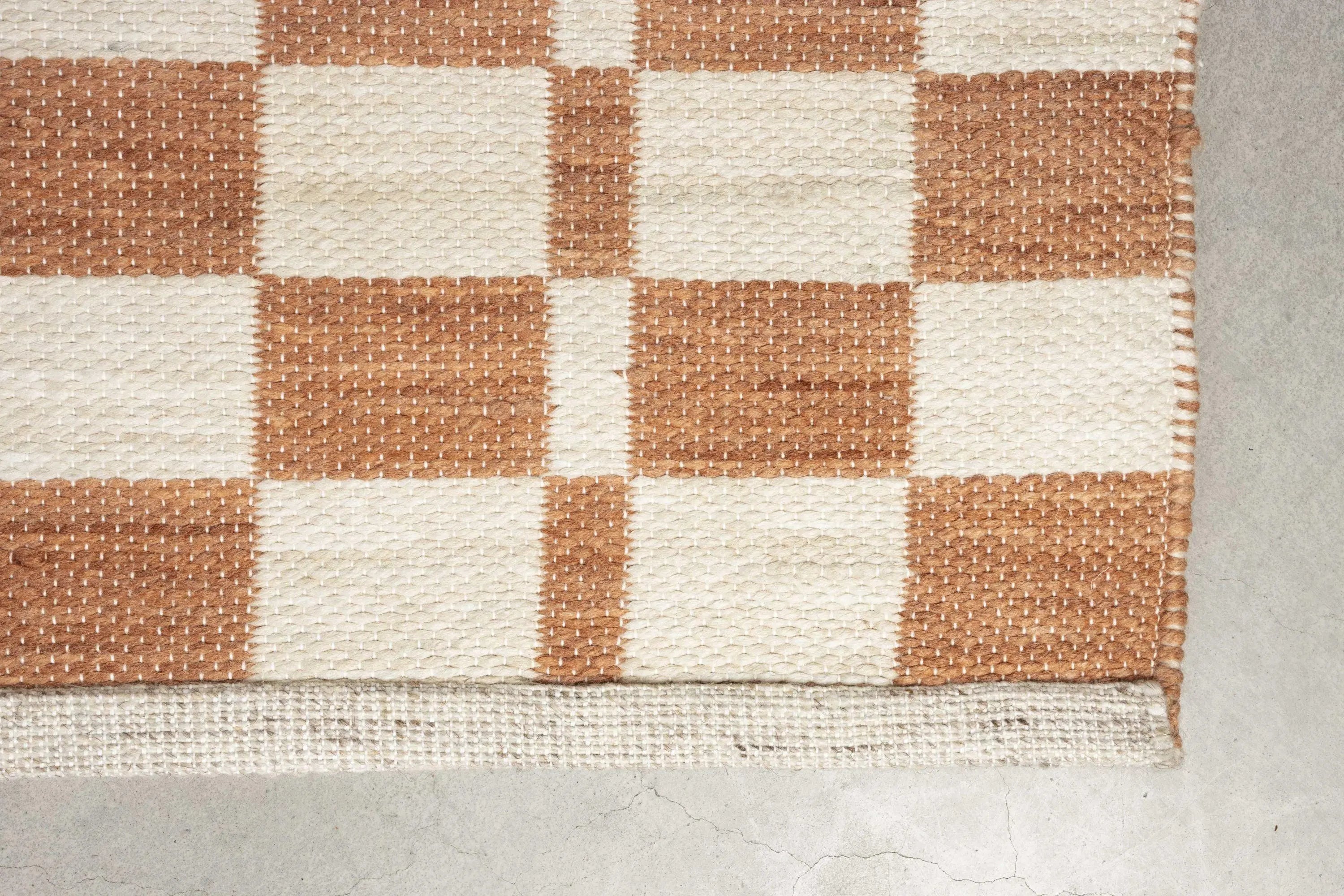 Dywan CHECKER ceglany Zuiver Eye on Design