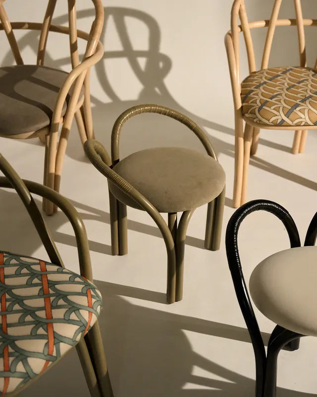 Upholstered BISTRA Chair with Rattan Ebony Base