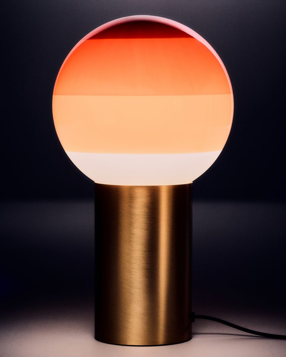 DIPPING chocolate table lamp with a gold base