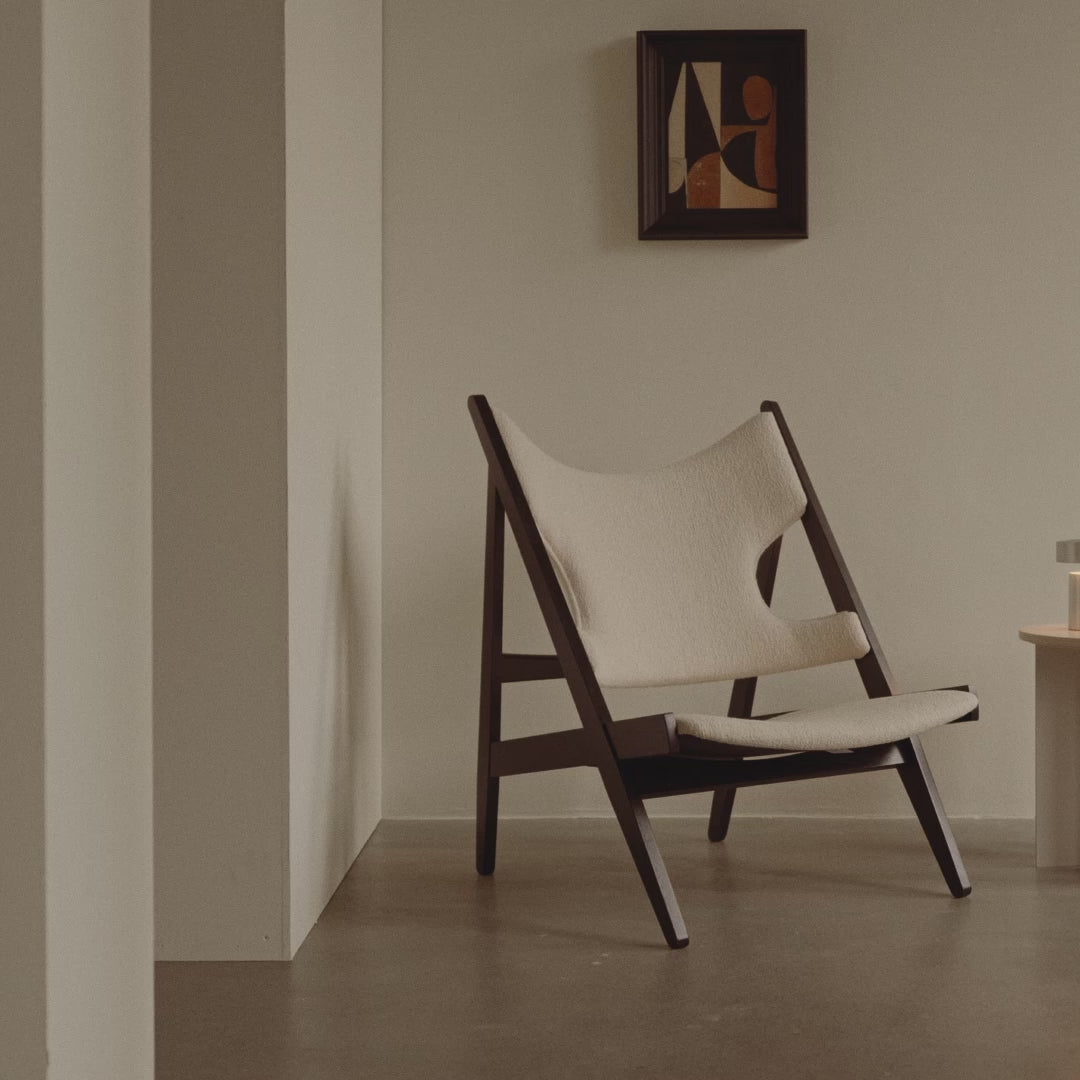 KNITTING armchair in cognac leather with oak base