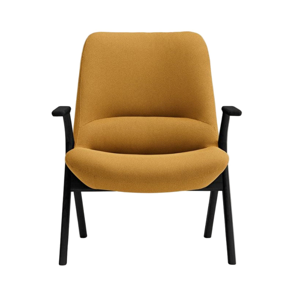 DINS mustard armchair with a black wooden base