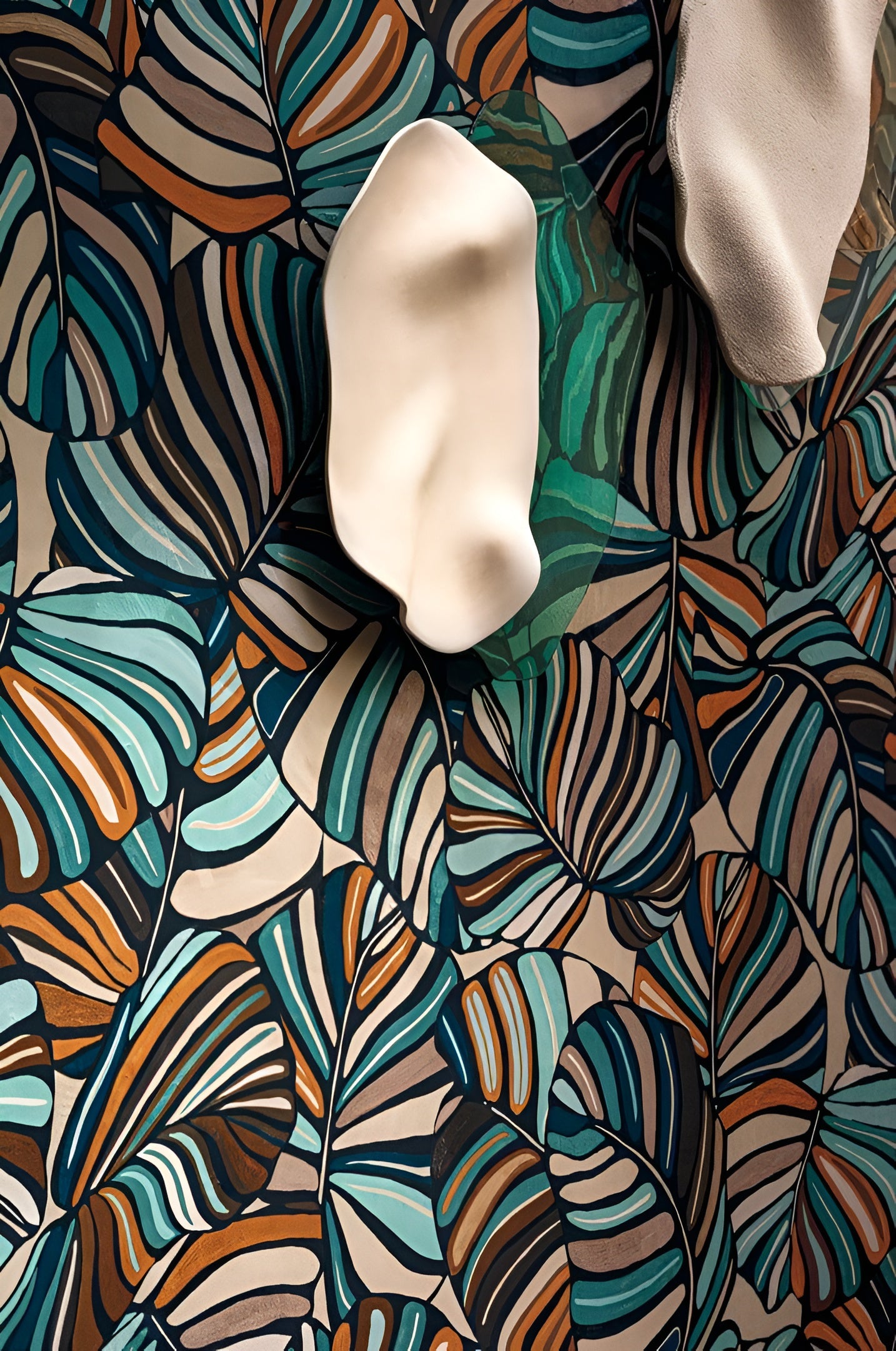 Textile wallpaper with a tropical leaf pattern PACHIRA - CELADON green with orange