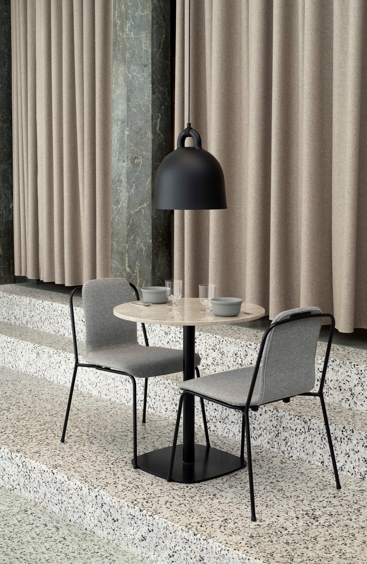 Studio chair brown ash veneer with a black base