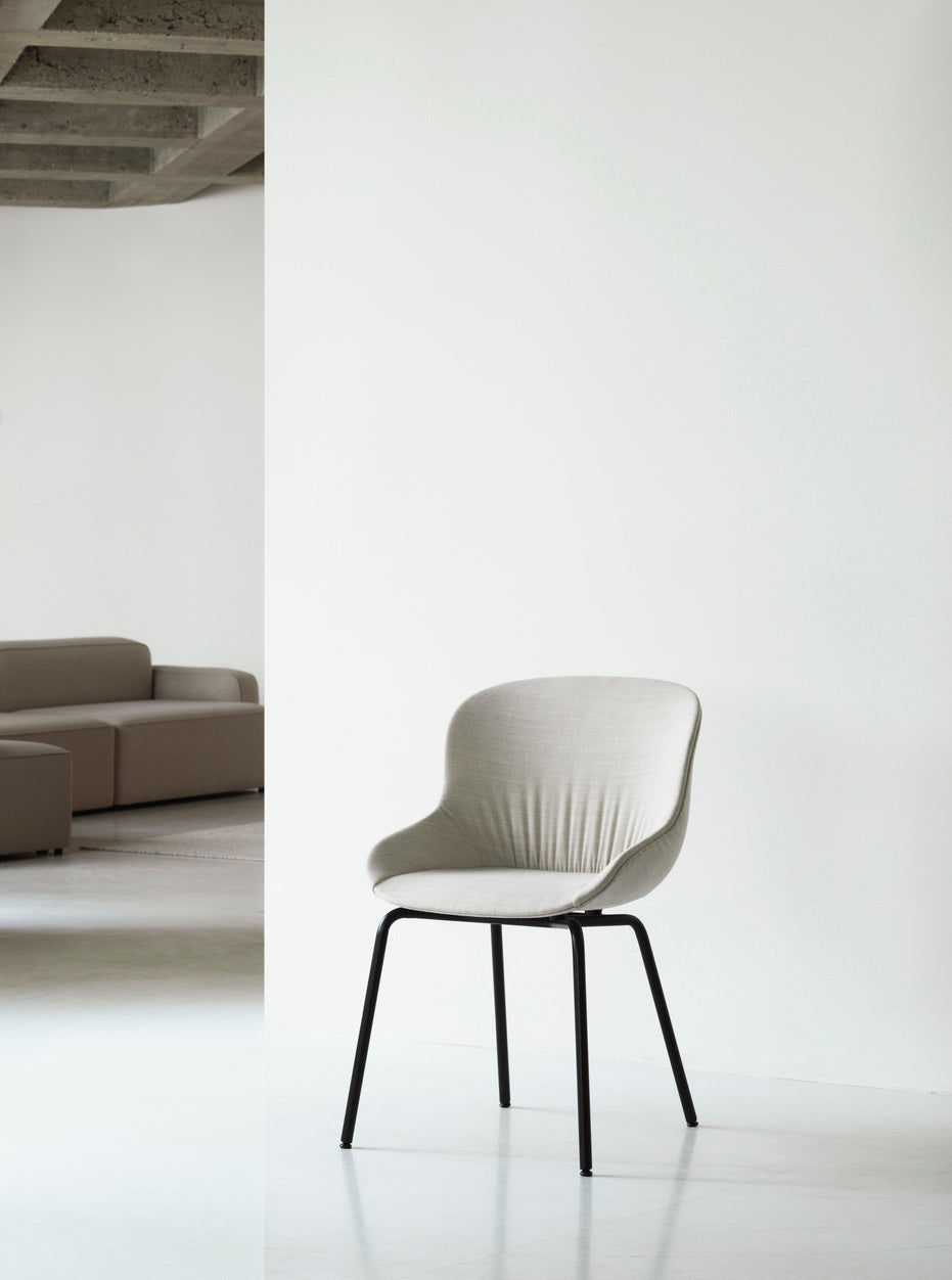 Hyg Comfort chair upholstered with a white base