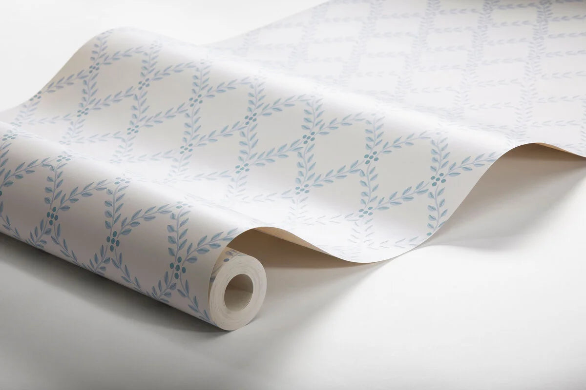 Wallpaper with a geometric plant pattern of TRELLIS LEAVES in cream with blue