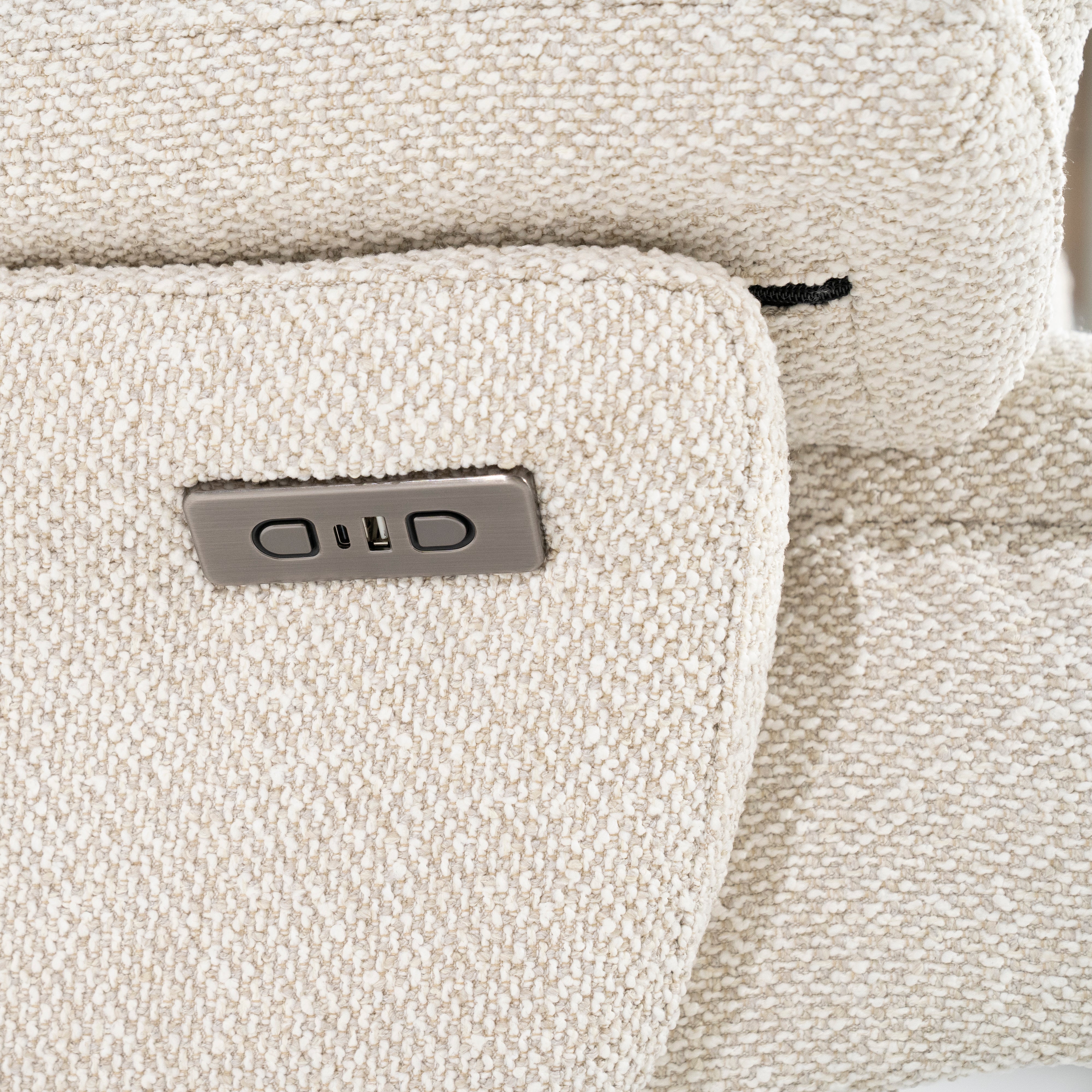 CALEB beige armchair with black base and footrest