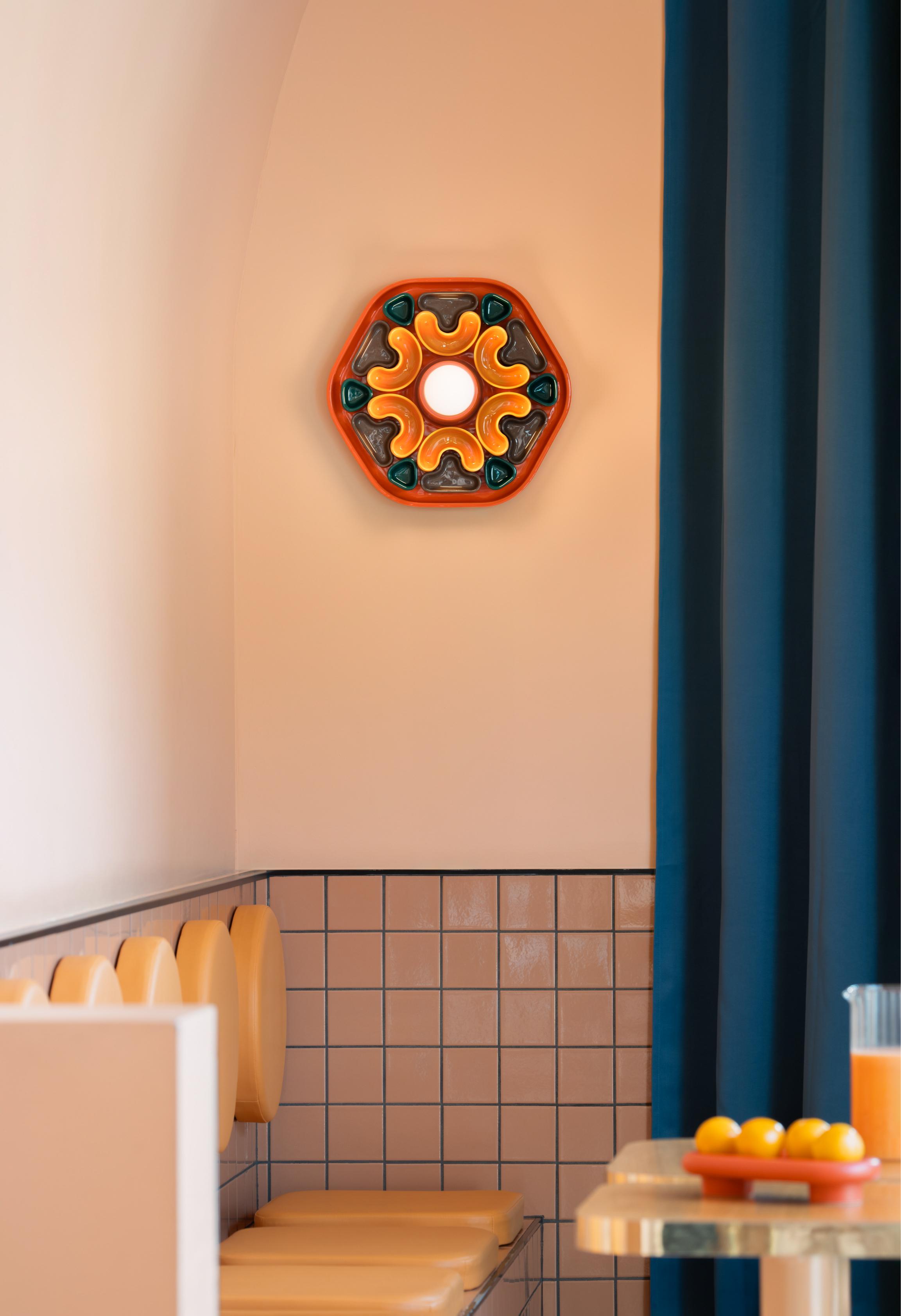 Ceramic wall lamp PHYTIA in orange with yellow, brown, and green