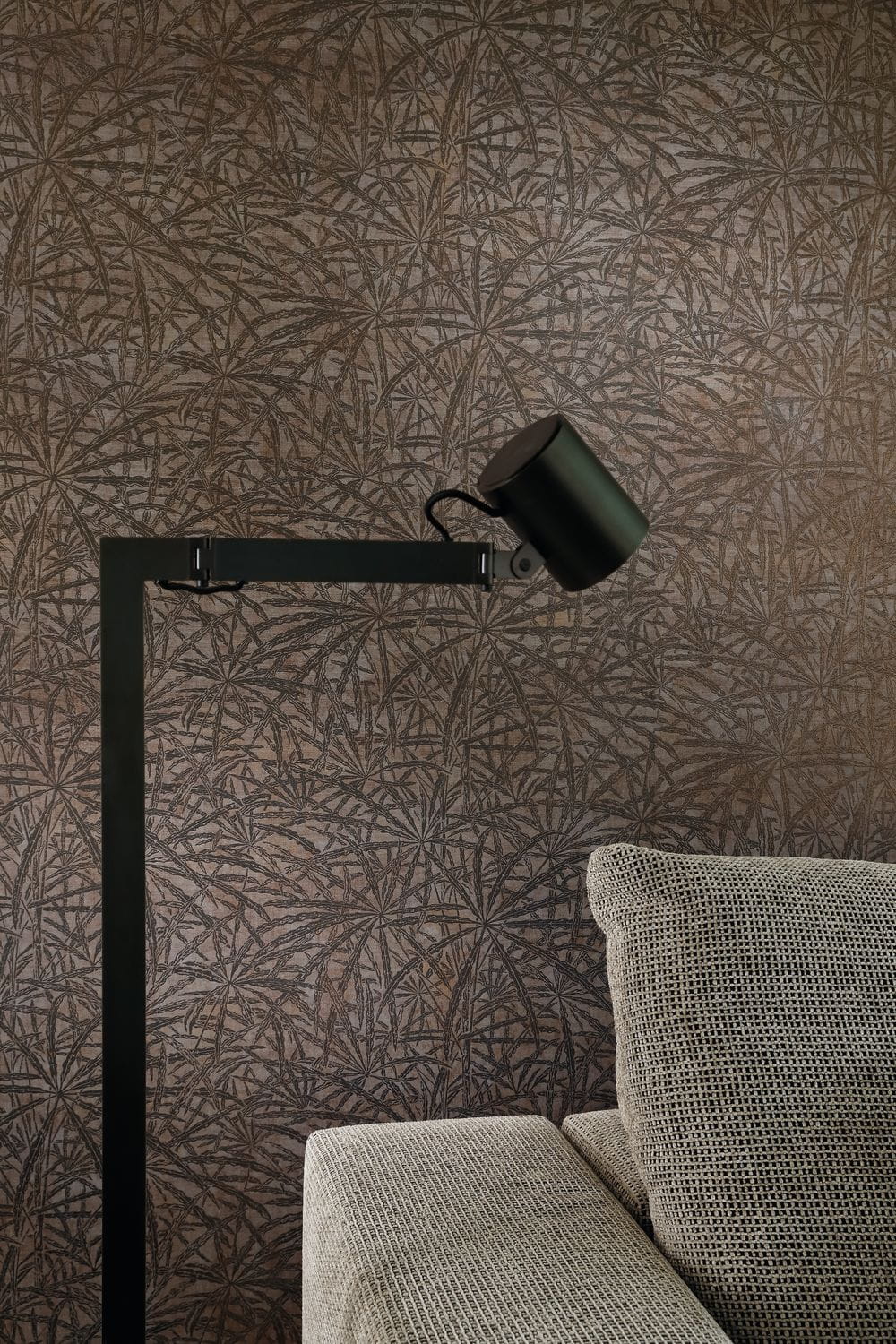 Structural wallpaper with a plant motif of palm leaves PALMYRE - GRAY TAUPE taupe with gray
