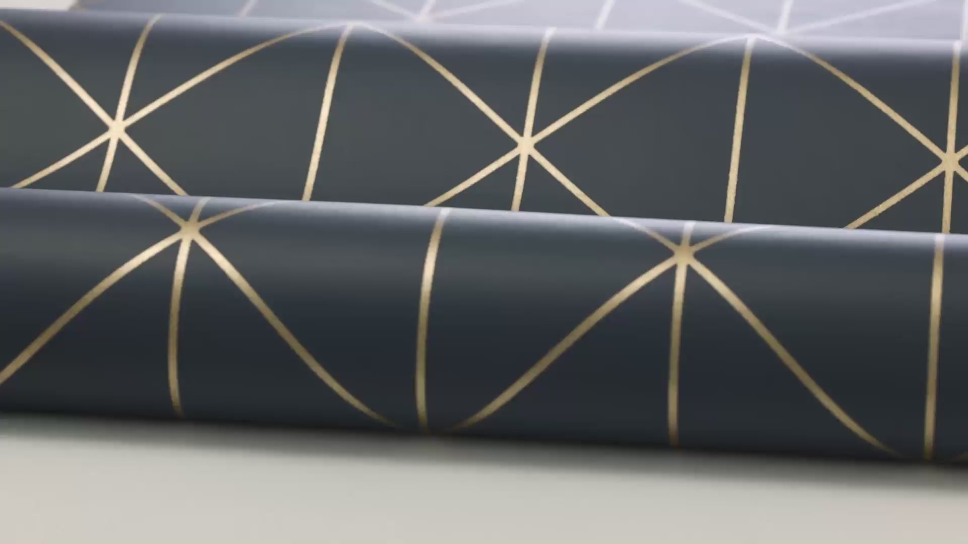 Non-woven paper wallpaper with a geometric DIAMONDS pattern in navy blue with gold