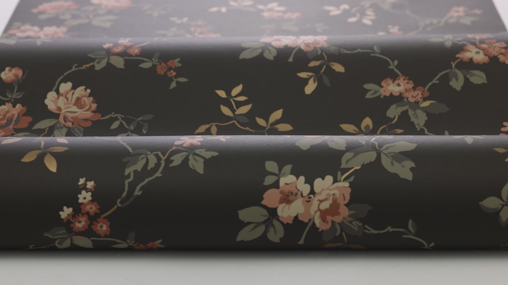 Non-woven paper wallpaper with a floral pattern VÄRMDÖ brown with pink