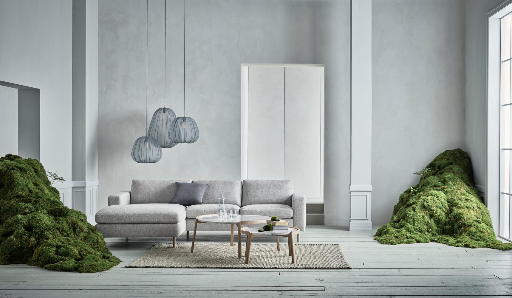 Sofa narożna rozkładana prawostronna 3-osobowa SCANDINAVIA z czarną podstawą
