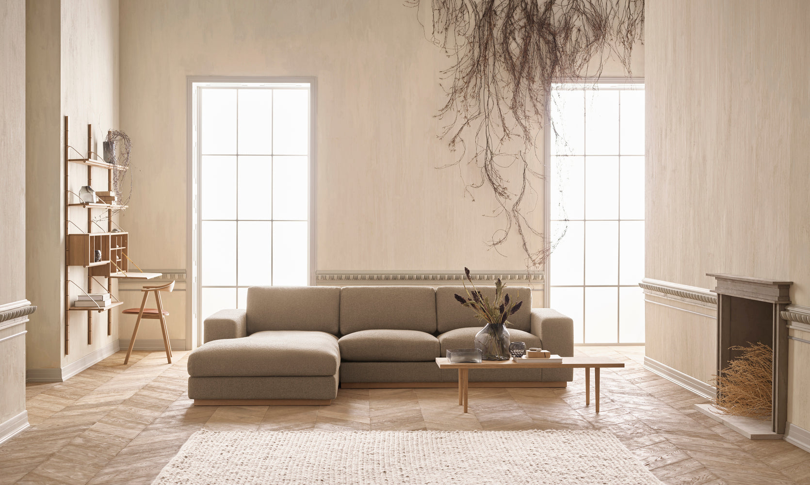 A corner with a left -hand sepia chaise with an oak base