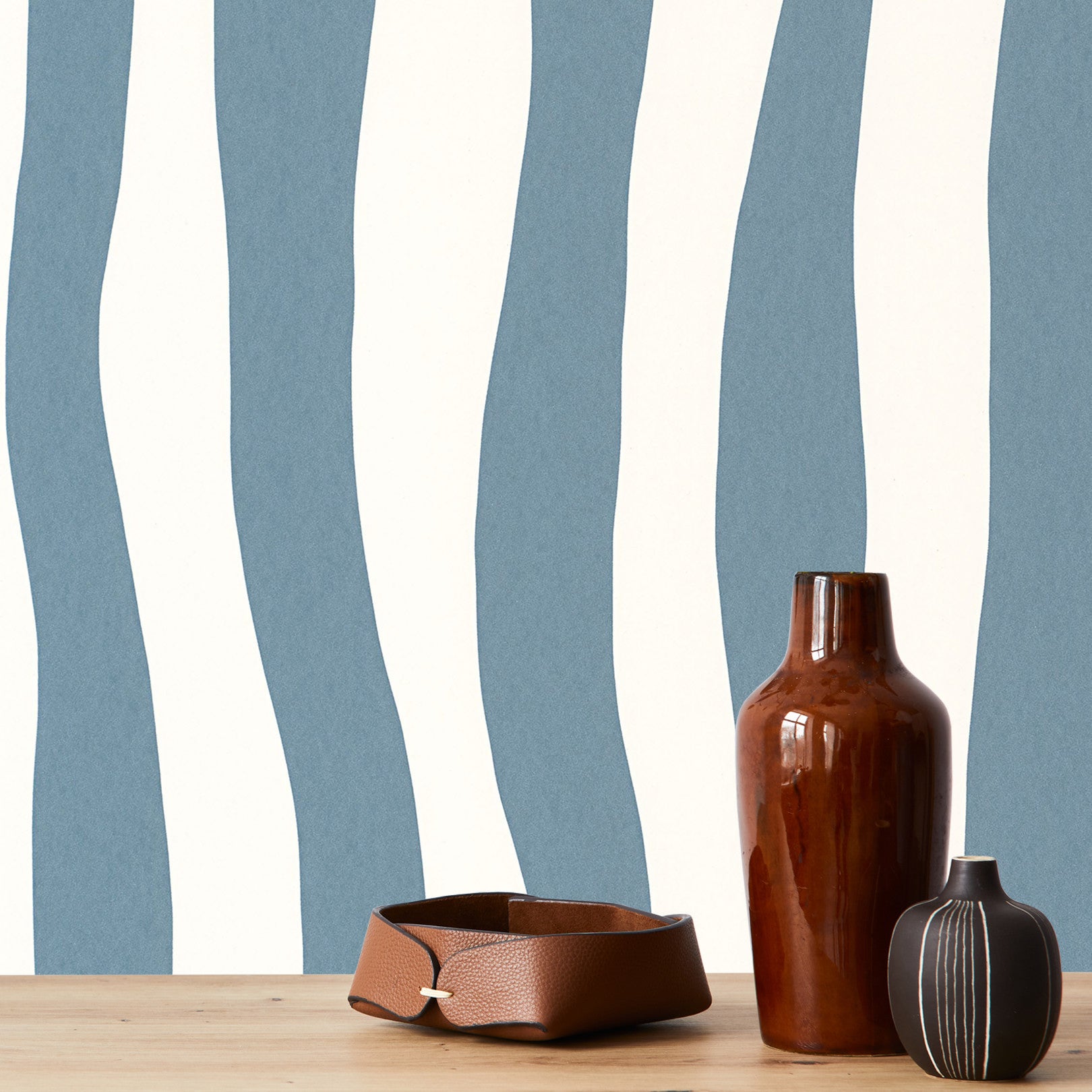 Structural wallpaper with an abstract wavy stripe pattern SUNDAE - BLEU PERSAN light blue
