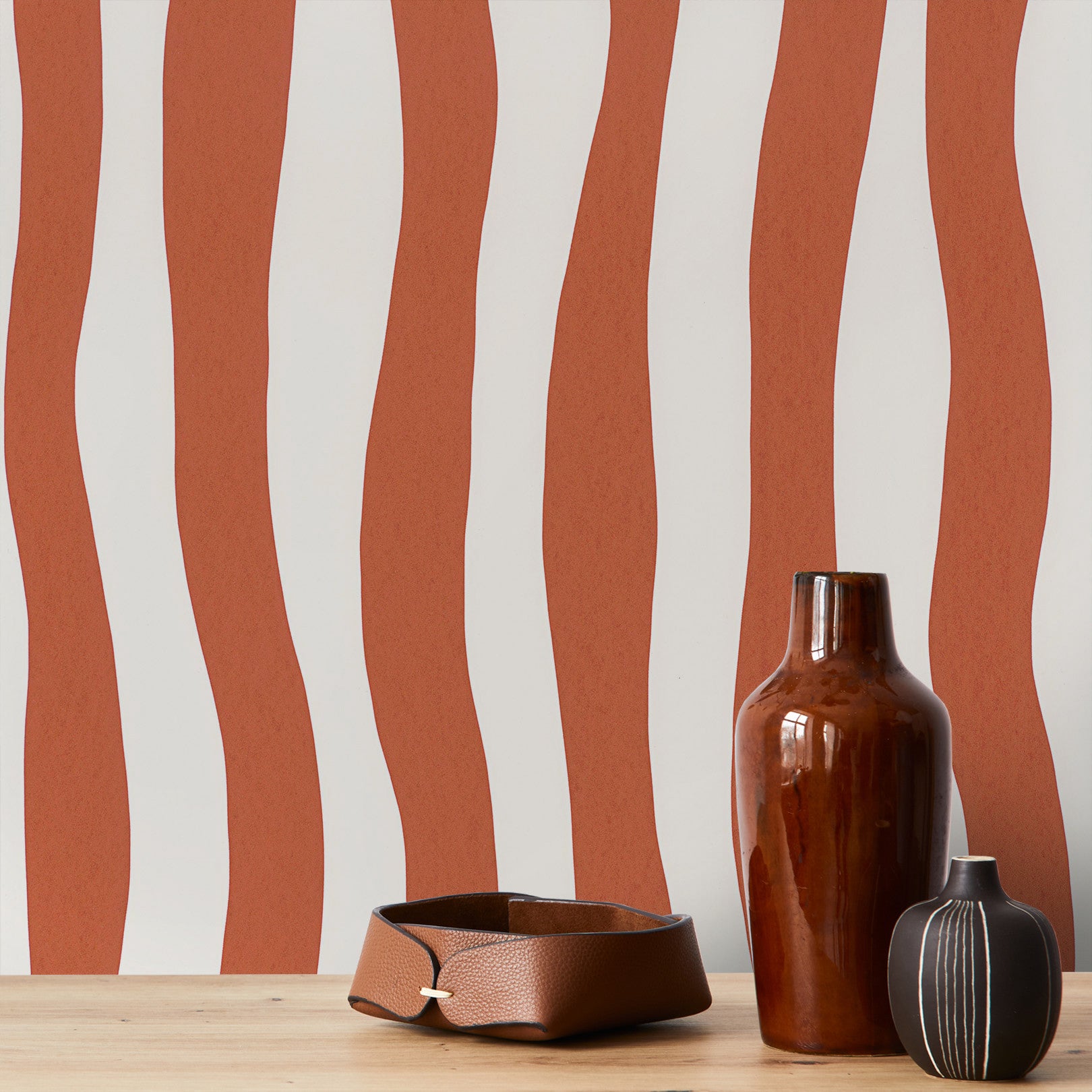 Textured wallpaper with an abstract wavy stripe pattern SUNDAE - TERRACOTTA